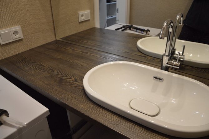 Плюсы и минусы деревянной столешницы под раковину в ванную